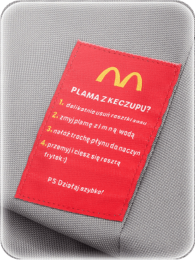 Szara pufa z żółtym wzorem w kształcie frytek