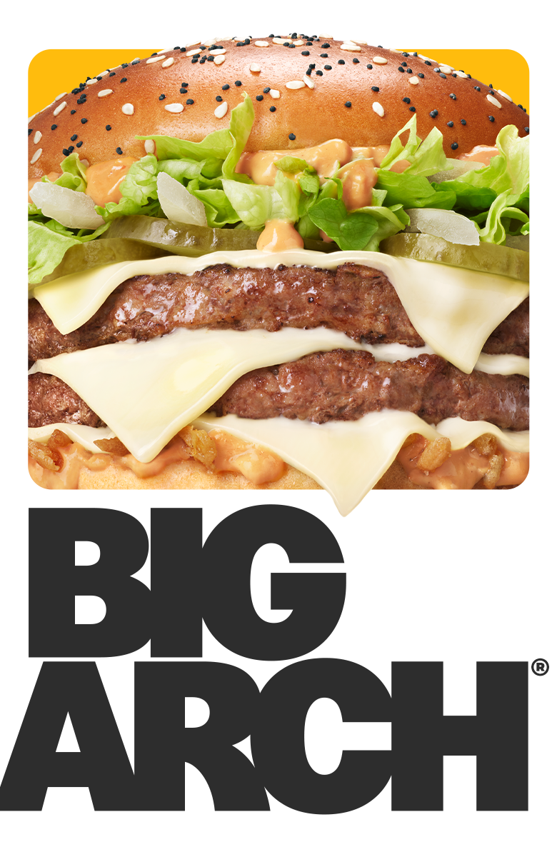 Grafika: Na pierwszym planie duży burger na żółtym tle, lekko nachodzący na czarny, mocno pogrubiony napis "BIG ARCH" na białym tle. Burger BIG ARCH składa się z dwóch kotletów wołowych, przełożonych trzema plasterkami białego sera cheddar, z dodatkiem pr